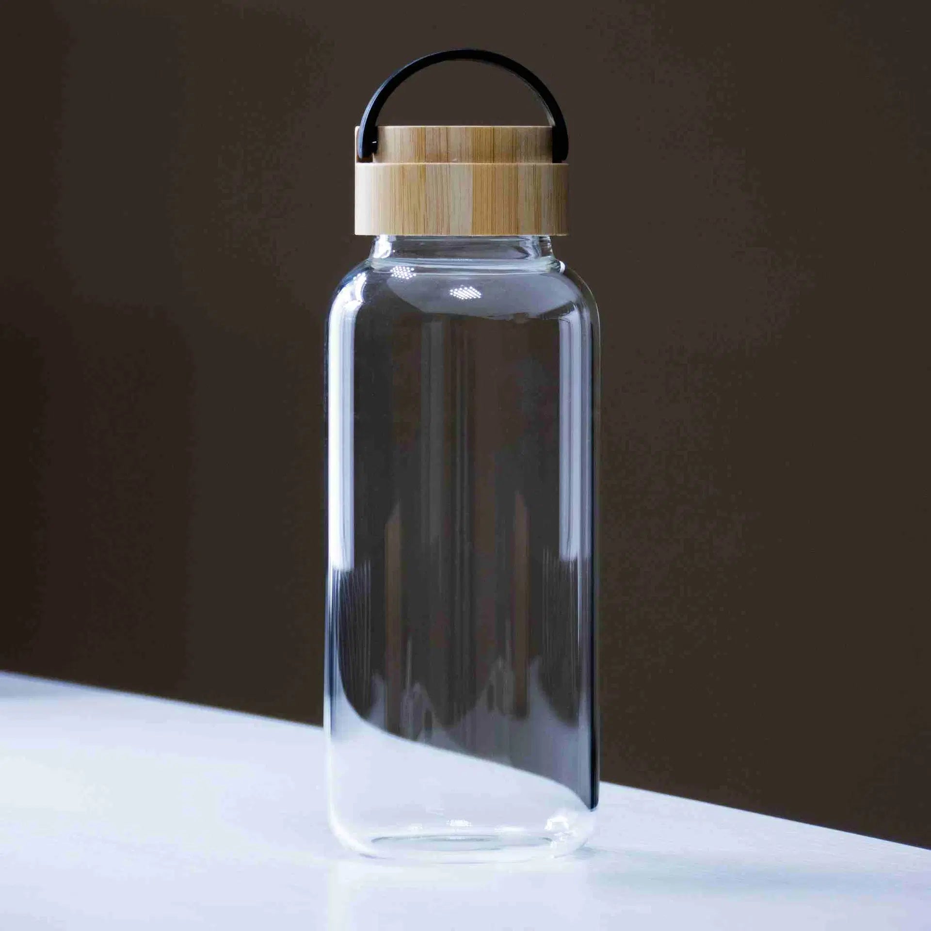 Glass Bottle With Eco Sleeve and Bamboo Lid